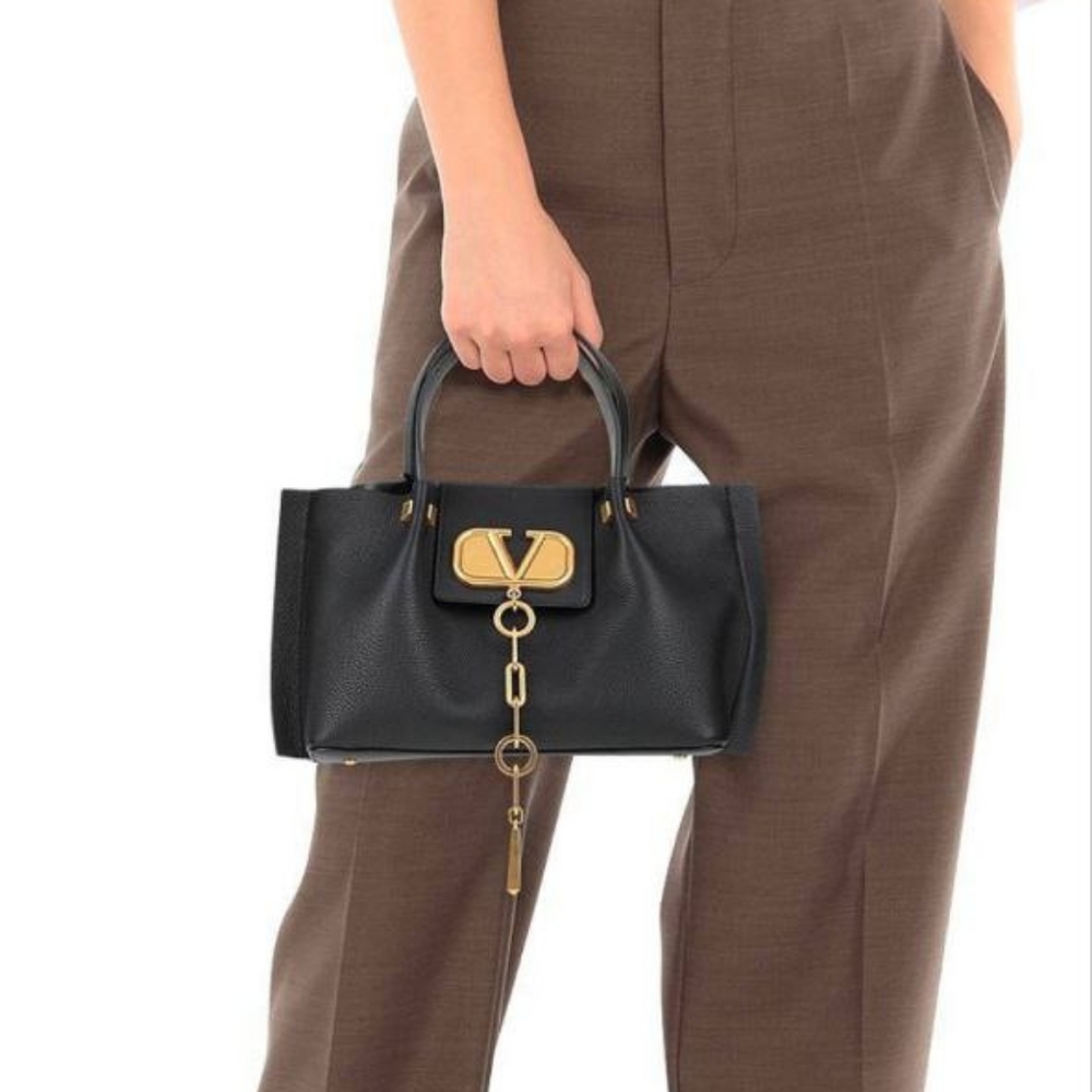 Valentino Garavani Black and Gold Handbag